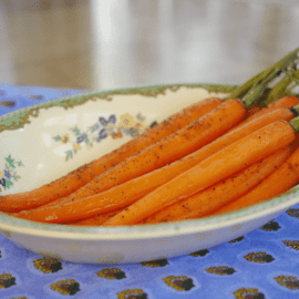 roasted carrots in an antique bowl